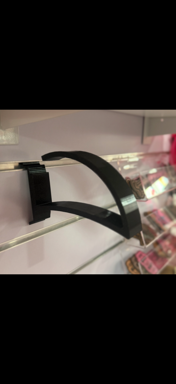 Slat wall hat hanger